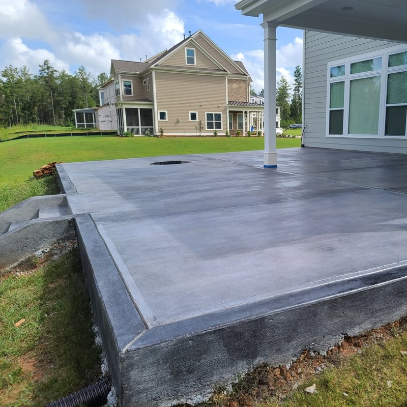 Fresh patio slab at the back of a house