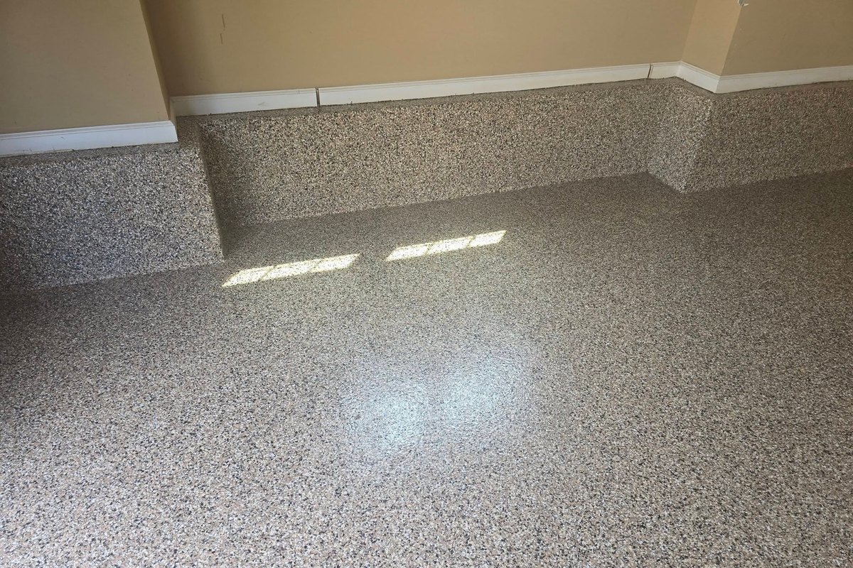 Flake epoxy floor in a two-bay garage